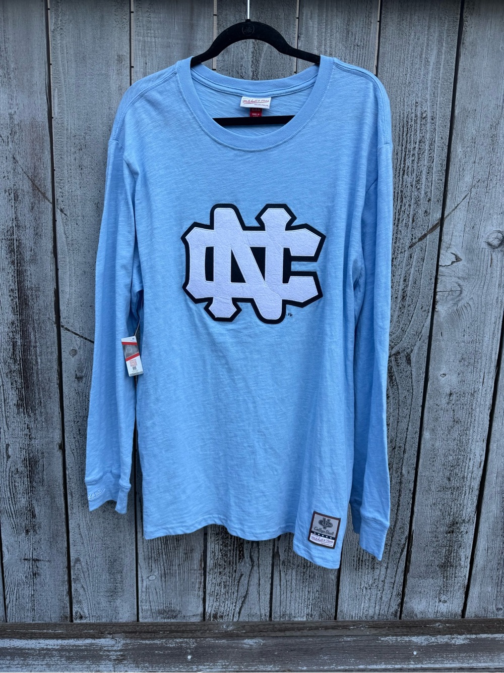 Mitchell & Ness Carolina Tar Heels Blue Long-Sleeve Tee with White & Black Logo